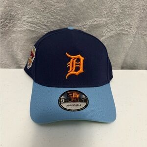 New Era Navy Crown Light Blue Brim Cap with Orange 'D' Logo
